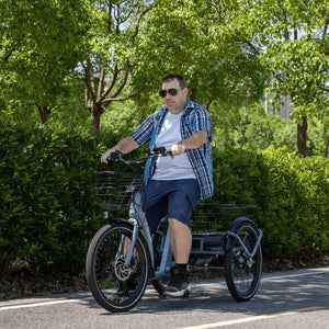 Man riding the Aitour Heal Middle electric trike 250W outdoors, showcasing its stable ride and comfortable step-through design.