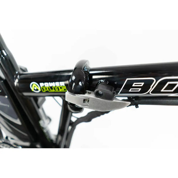 Close-up of the quick-release frame folding mechanism on the Basis Boxer e-bike.