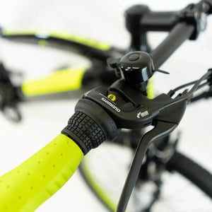 Shimano RevoShift gear shifter on the Basis Hunter Unisex Electric Mountain Bike with ergonomic grip design.