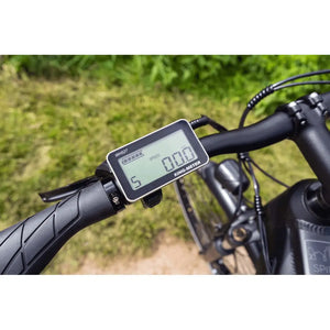 Close-up view of the Dawes Spire 1.0 Crossbar electric hybrid bike handlebar with digital display.