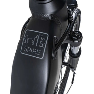 Close-up of the Dawes Spire 1.0 Low Step electric hybrid bike’s front frame with Spire city and trees logo.