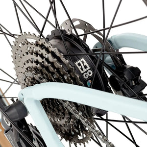 Close-up of the EZEGO Trail Destroyer II’s rear wheel showing the Shimano gear system and integrated EZEGO hub motor with disc brake.