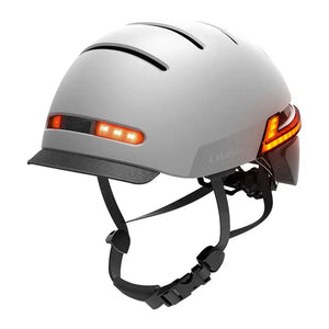 Side view of the Livall BH51M Neo smart cycling helmet in grey, featuring integrated LED rear lights and adjustable straps.