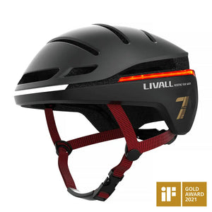 Side view of the Livall EVO21 smart cycling helmet in black with red straps, featuring integrated LED lights.