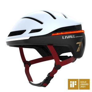 Side view of the Livall EVO21 smart cycling helmet in white with red straps, featuring integrated LED lights.