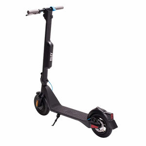 Left angled view of the Riley RS1 V2 electric folding scooter with slim frame, detachable battery, and compact wheels.