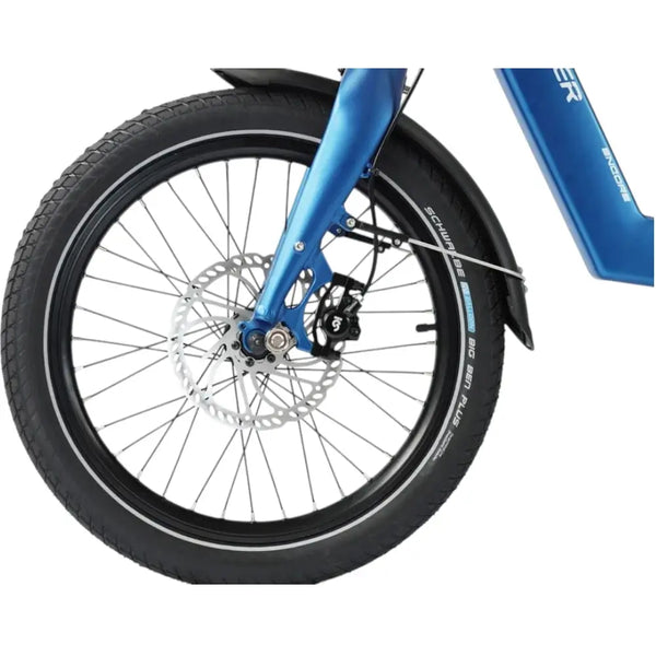 Close-up of the front wheel and disc brake on the Wisper Tailwind 806 Encore Folding E-Bike in blue, featuring Schwalbe tyres and mudguard