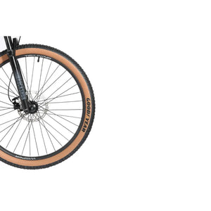 Wisper Tailwind electric bike front disc brake and Peak TC Ultimate tyre close-up with RockShox fork