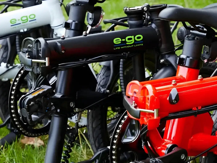 Close-up of folding electric bike frames and hinge mechanisms, highlighting compact design features ideal for UK commuting and storage.