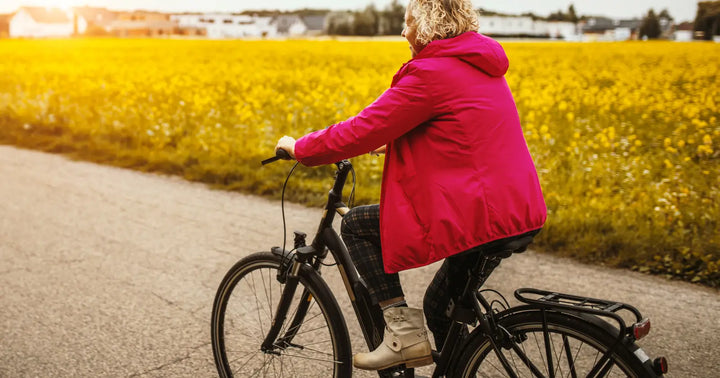 A short rider driving her electric bike.
