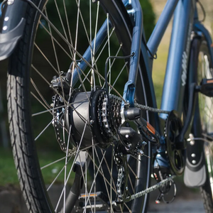 Close-up of electric bike rear hub motor and drivetrain on a Commuter E-bike