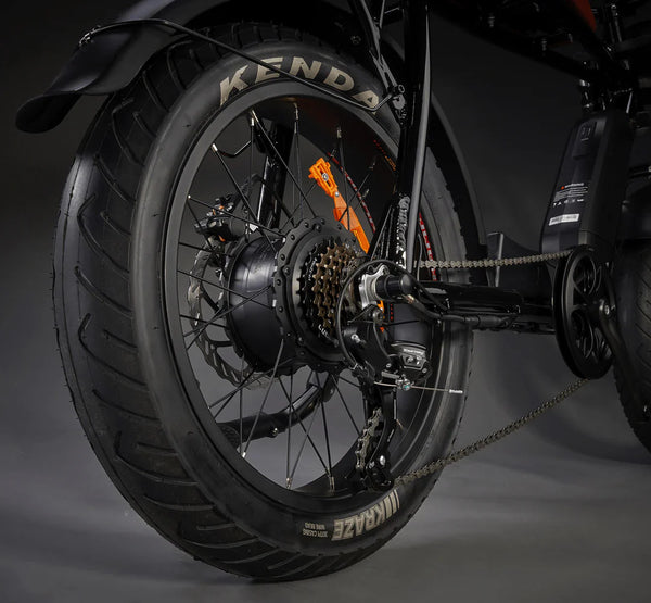 Fat tyre electric bike in a black studio background