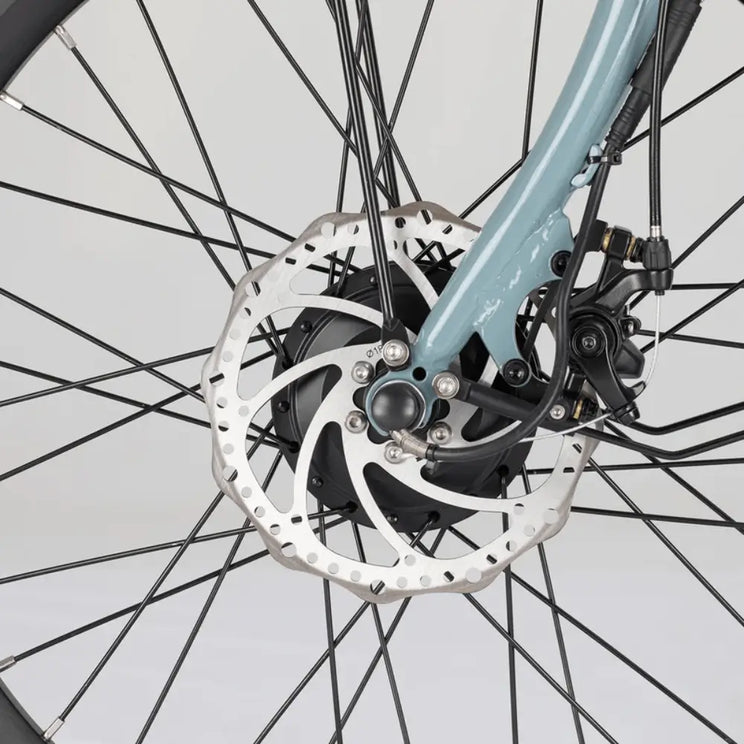 Close-up of the Aitour Heal Middle Electric Trike front disc brake system and front hub motor.