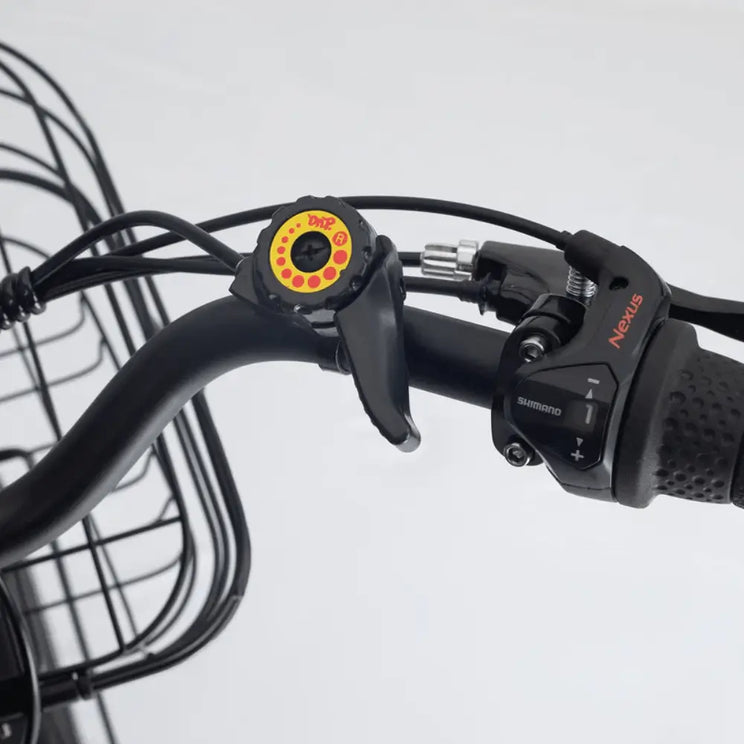 Close-up of the Aitour Heal Mini Folding Electric Trike 250W handlebar with Shimano Nexus shifter and mounted bell.