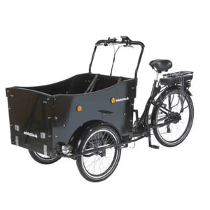 The Amcargobikes Curve showing the enclosed cargo box and stable three-wheel design.