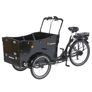 Angled view of the Amcargobikes Curve showing the enclosed wooden cargo box and sturdy three-wheel frame.