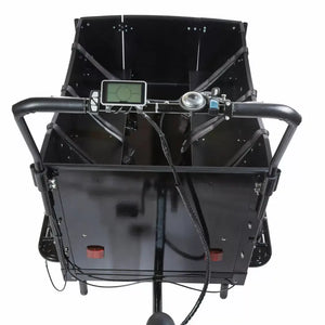 The black Amcargobikes Curve electric cargo trike, designed for safe family and kindergarten transport.