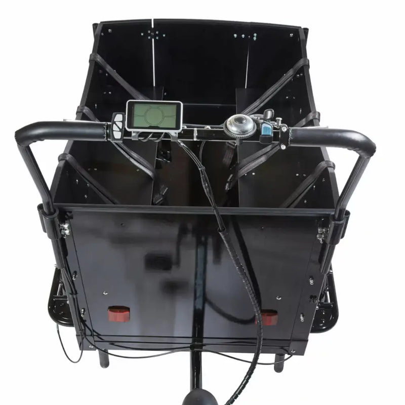 The black Amcargobikes Curve electric cargo trike, designed for safe family and kindergarten transport.