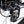 Close-up of the Shimano Altus rear derailleur and cassette with derailleur guard on the Ampere Deluxe.