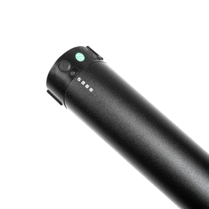 Close-up of the power button and LED charge level indicator lights on the Deluxe Pro battery.