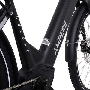 Close-up of the mid-drive motor housing and integrated downtube battery on the black Ampere Deluxe Pro electric bike.