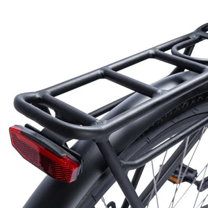 Rear pannier luggage rack with integrated red safety reflector on the Ampere Deluxe Pro.