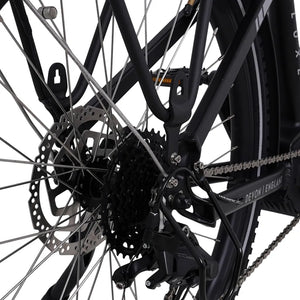 Detail of the rear frame triangle showing the disc brake rotor and Devon England branding on the  black Ampere Deluxe Pro.