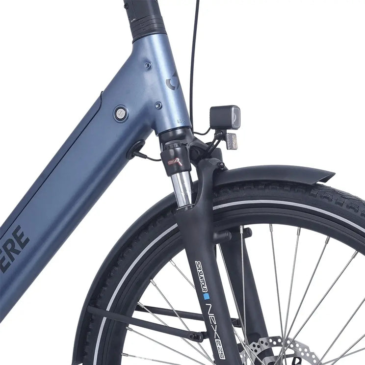 Close-up of the Ampere Deluxe Pro stone blue front fork suspension and integrated LED headlight.