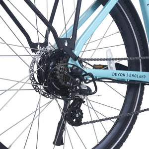 Close-up of the Ampere Deluxe pale blue rear chainstay showing Shimano Altus derailleur disc brake and Devon England branding.