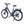 Ampere Deluxe stone blue step-through electric bike from a front three-quarter angle with kickstand deployed.