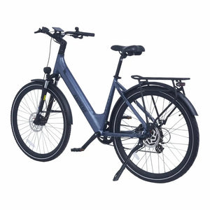 Ampere Deluxe stone blue step-through electric bike from a front three-quarter angle with kickstand deployed.
