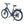 Ampere Deluxe stone blue step-through electric bike from a front three-quarter angle with kickstand deployed.