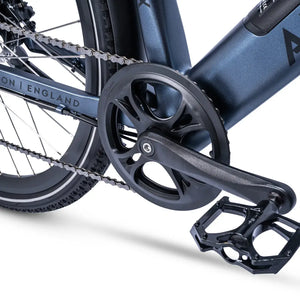 Close-up of the crankset, pedals, and drivetrain on the Ampere Hilux electric bike in stone blue.