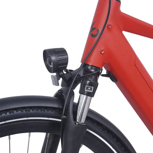 Close-up of the Ampere Hilux Crossbar molton red front fork with mounted LED headlight and suspension detail.