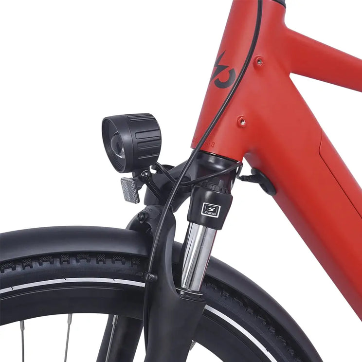 Close-up of the Ampere Hilux Crossbar molton red front fork with mounted LED headlight and suspension detail.