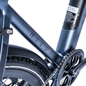 Close-up of the Hilux branding on the stone blue frame of the Ampere Hilux hybrid electric bike.