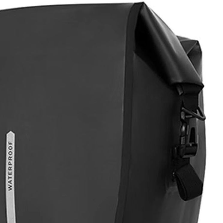 Close up of the Ampere pannier bag roll top closure and side buckle strap