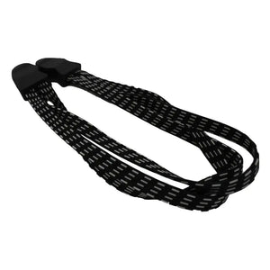 Close-up of the Ampere pannier rack strap featuring durable black elastic material with reflective stitching and secure hooks for fastening luggage to a bicycle rack.