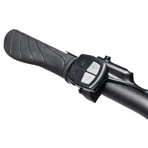 Handlebar control pad buttons for power assist levels on the Ampere X-Trail.