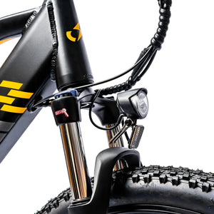 Front suspension fork crown and LED headlight detail on the Ampere X-Trail.