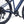Detailed view of the Ampere X-Trail stone blue drivetrain showing crankset chain and rear derailleur.