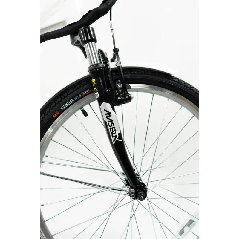 Close-up of the Masera suspension fork and front wheel on the Basis Dorchester 24-inch e-bike.