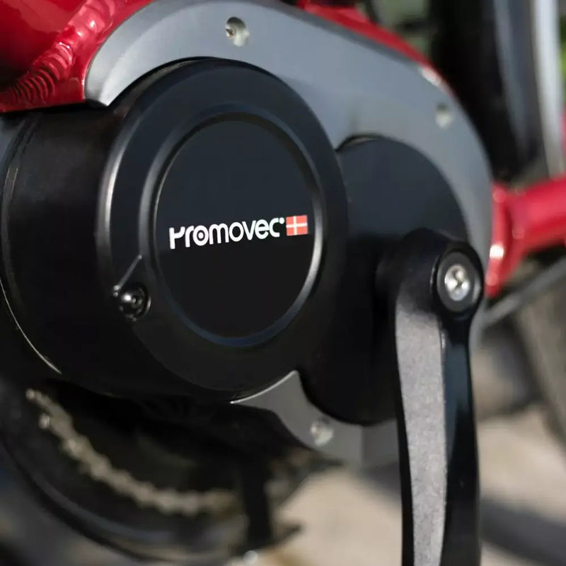 Close-up of the Promovec mid-drive motor on the Batribike Nebula Classic electric bike, highlighting its black casing and branding.