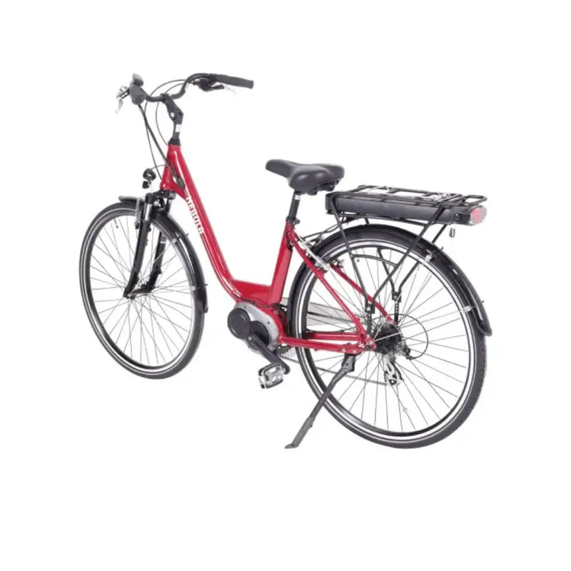 Rear angled view of the Batribike Nebula Classic step-through electric bike in red, showcasing the rear rack battery, mudguards, and kickstand.