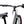 Swept handlebar, bell and comfort saddle on the white Batribike Route S seen from behind