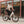 Woman riding the white Batribike Route S electric bike on a city street.