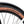 Close up of the brown wall VEE Speedster tyre under the mudguard of the white Batribike Route S
