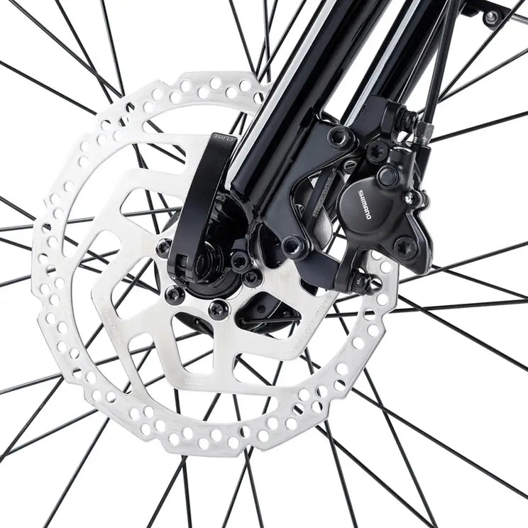 Shimano hydraulic disc brake and silver rotor on Batribike Route X front wheel.
