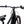 Swept handlebar with display, bell and gear shifter above the glossy black Batribike Route X frame