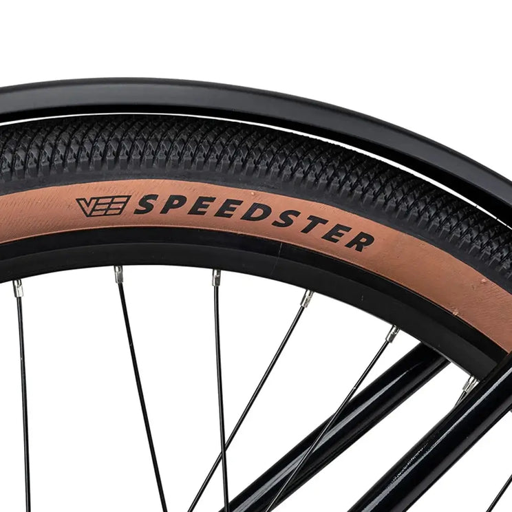 VEE Speedster tan wall tyre close up on Batribike Route X with black alloy rim.